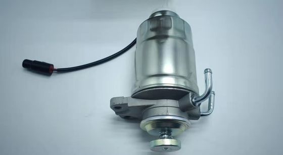 Filter bahan bakar diesel berkualitas tinggi dengan kertas filter impor untuk Mitsubishi L300 L400 ukuran standar